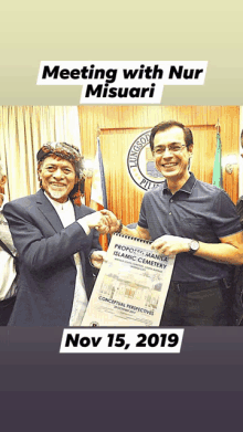 two men shaking hands in front of a sign that says ' meeting with nur misuari '