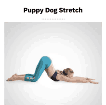 a woman is doing a puppy dog stretch on her back