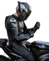 a man sitting on a motorcycle wearing a helmet and a dainese leather suit