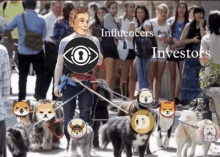 a man is walking a group of dogs with a sign that says influencers