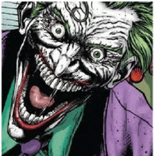 a close up of the joker 's face with his mouth open and his tongue hanging out .