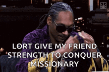 snoop dogg is wearing sunglasses and a purple robe and says ' lort give my friend strength to conquer missionary '