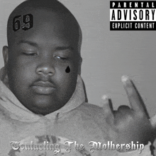 a man with the number 69 on his forehead is on a parental advisory explicit content album cover