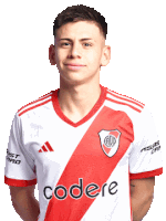 a young man wearing a red and white jersey with the word coders on it