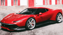 a red ferrari sports car is parked in front of a building