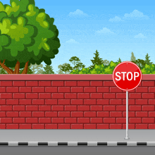 a red brick wall with a stop sign in front of it