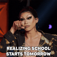 a picture of a drag queen with the words realizing school starts tomorrow above her