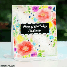 a birthday card for ms. shehla with colorful flowers