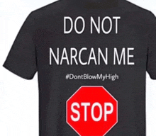 a black t-shirt says do not narcan me and has a stop sign on it