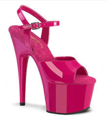 a pair of pink high heels with a buckle on the side