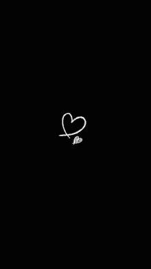 a black background with a white heart and leaf .