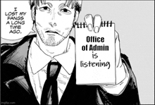 a man in a suit and tie is holding a note that says office of admin is listening