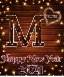 a happy new year card with the letter m on it