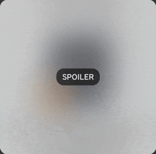 a button that says spoiler on it on a grey background