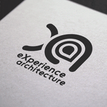 a logo for experience architecture is printed on a piece of paper