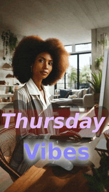 a woman sits at a desk in front of a computer with the words thursday vibes behind her