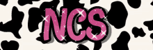 a cow print background with the word ncs written in pink