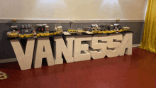 a candy bar with the name vanessa in large white letters