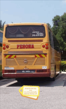 a yellow bus that says pesona on the back of it