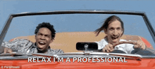 two men are laughing in a car with the words relax i 'm a professional below them