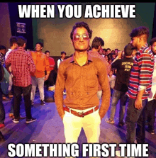 a man wearing sunglasses stands in front of a crowd with a caption that says when you achieve something first time