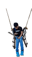 a boy sitting on a swing holding a sword and a phone