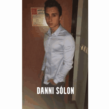 a man standing in front of a door with the name danni solon written below him