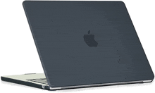 a black macbook pro laptop with a case on it .