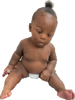 a baby in a diaper is sitting on a white surface