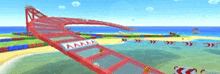 a video game scene with a red bridge that says aaa