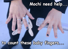 a picture of a person 's hands with a caption that says mochi need help to count these baby fingers