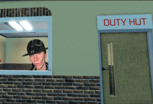 a man in a hat looks out a window next to a duty hut