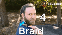 a man with a beard is pointing at a braid