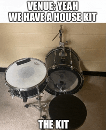 a drum set with a caption that says venue yeah we have a house kit the kit