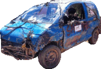 a damaged blue car with a sticker on the door that says ' a ' on it