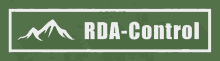 a green sign that says rda-control with a mountain in the corner