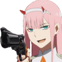 a girl with pink hair and horns is pointing a gun at the camera