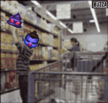 a blurred image of a grocery store with buzza written on the bottom