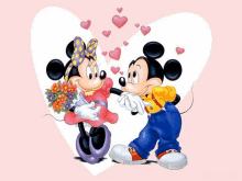 a cartoon of mickey mouse and minnie mouse kissing in front of a heart