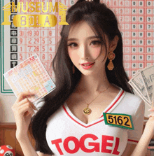 a woman wearing a shirt that says ' togel ' on it is holding money and lottery tickets