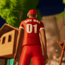 a man wearing a red shirt that says day one on it