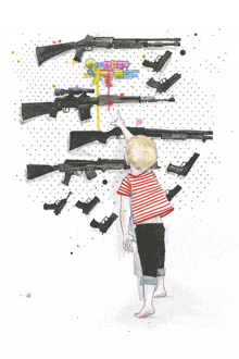 a boy in a red and white striped shirt is pointing at a wall of guns