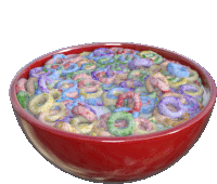 a red bowl filled with rainbow colored cereal on a white background