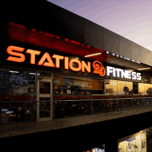 a building with a sign that says station 2 fitness