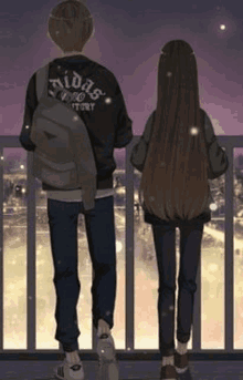 a boy and a girl are standing next to each other on a balcony and looking at the city .