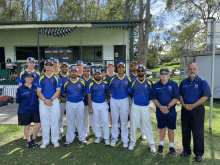 a group of cricket players are posing for a photo in front of a building that says ' masters ' on it