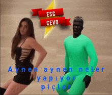 a woman in a black dress stands next to a man in a green shirt with the words esc cevo written above them