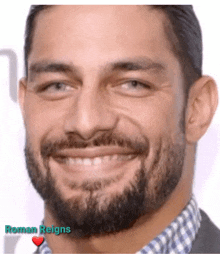 a close up of a man 's face with roman reigns written in the corner