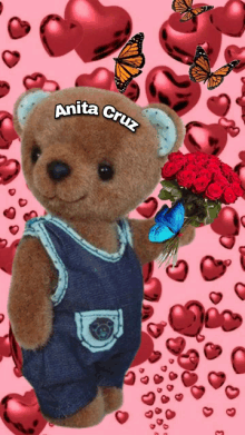 a teddy bear holding a bouquet of red roses with the name anita cruz on it