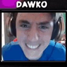 a picture of a man with headphones and the name dawko